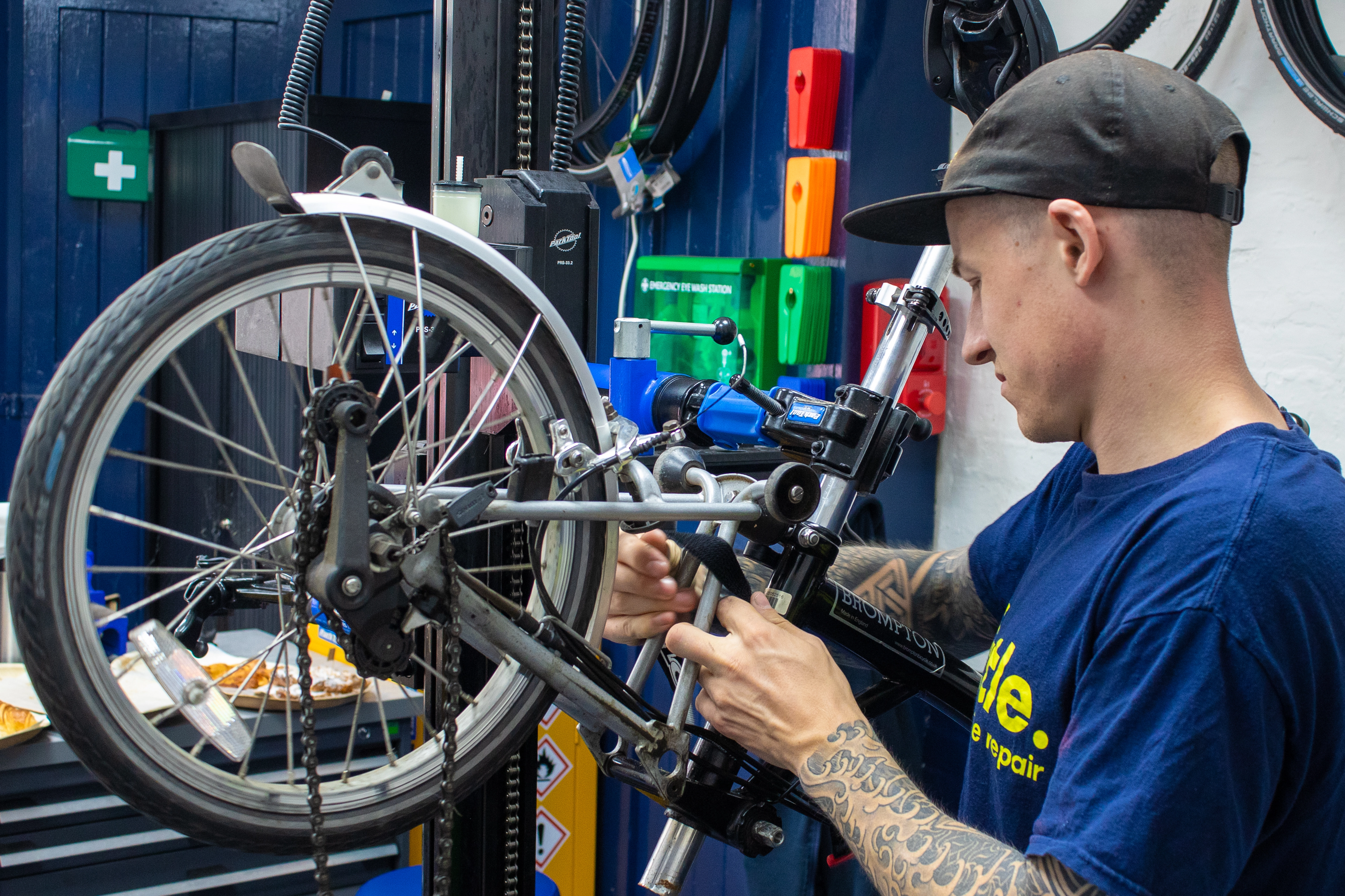 Mechanic cleaning bike